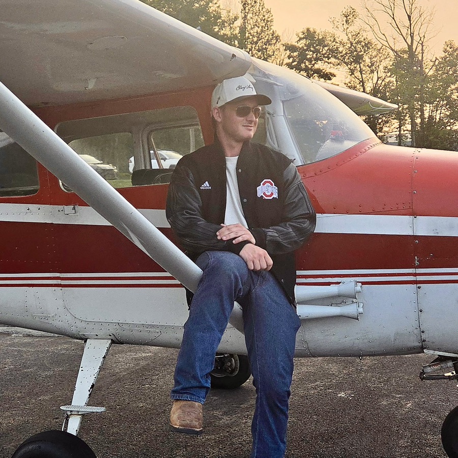 Joseph Pettinato beside a Cessna 172